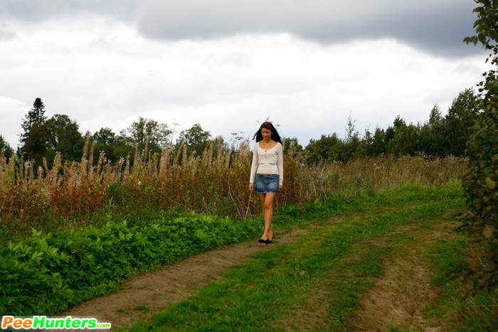 Piss. Babe tinkles on a road in the middle  - XXX Dessert - Picture 1