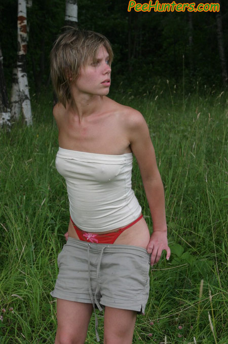 Pissing. Cute teen peeing in the park. - XXX Dessert - Picture 2