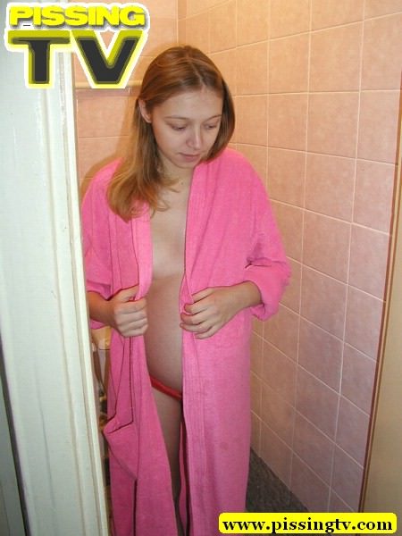 Pee. Pregnant teen  in pink dress-gown piss - XXX Dessert - Picture 3
