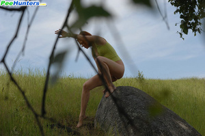 Pee. Babe tinkles on a rock in the middl - XXX Dessert - Picture 8