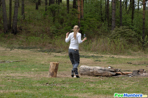 Girl pissing. Girl goes to the woods to  - Picture 2