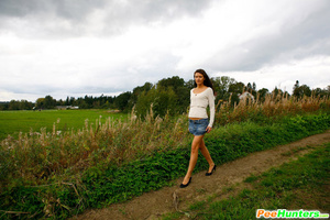 Piss. Babe tinkles on a road in the midd - XXX Dessert - Picture 4
