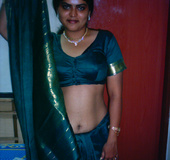 India nude. Neha in traditional green saree stripping naked.