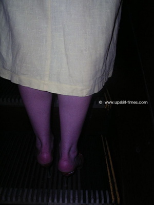 Upskirt pics. Long-legged babe standing  - Picture 9