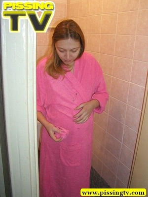 Pee. Pregnant teen  in pink dress-gown p - Picture 2