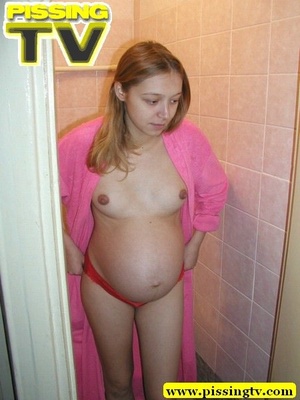 Pee. Pregnant teen  in pink dress-gown p - Picture 4