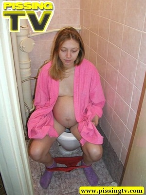 Pee. Pregnant teen  in pink dress-gown p - Picture 8