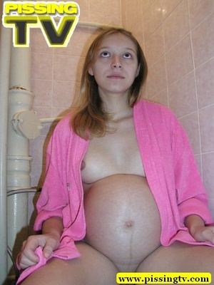 Pee. Pregnant teen  in pink dress-gown p - Picture 9