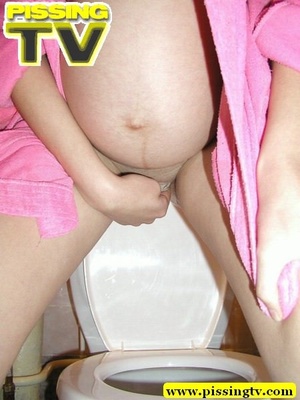 Pee. Pregnant teen  in pink dress-gown p - Picture 20